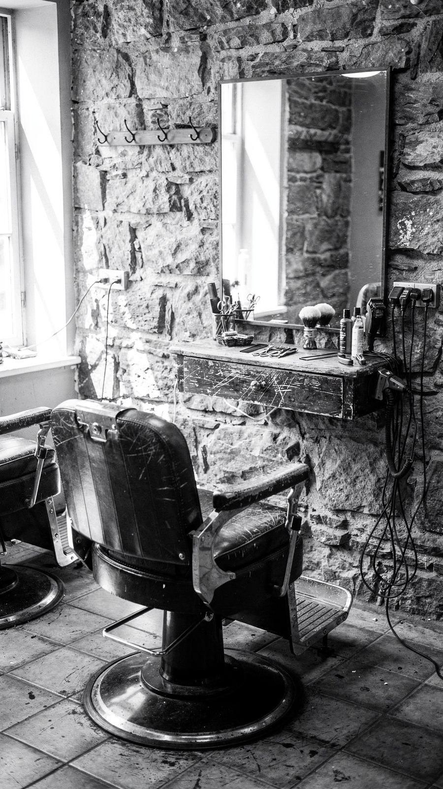 Black-and-white photograph of the barber workshop on Verkhniy Val in Podil, Kyiv